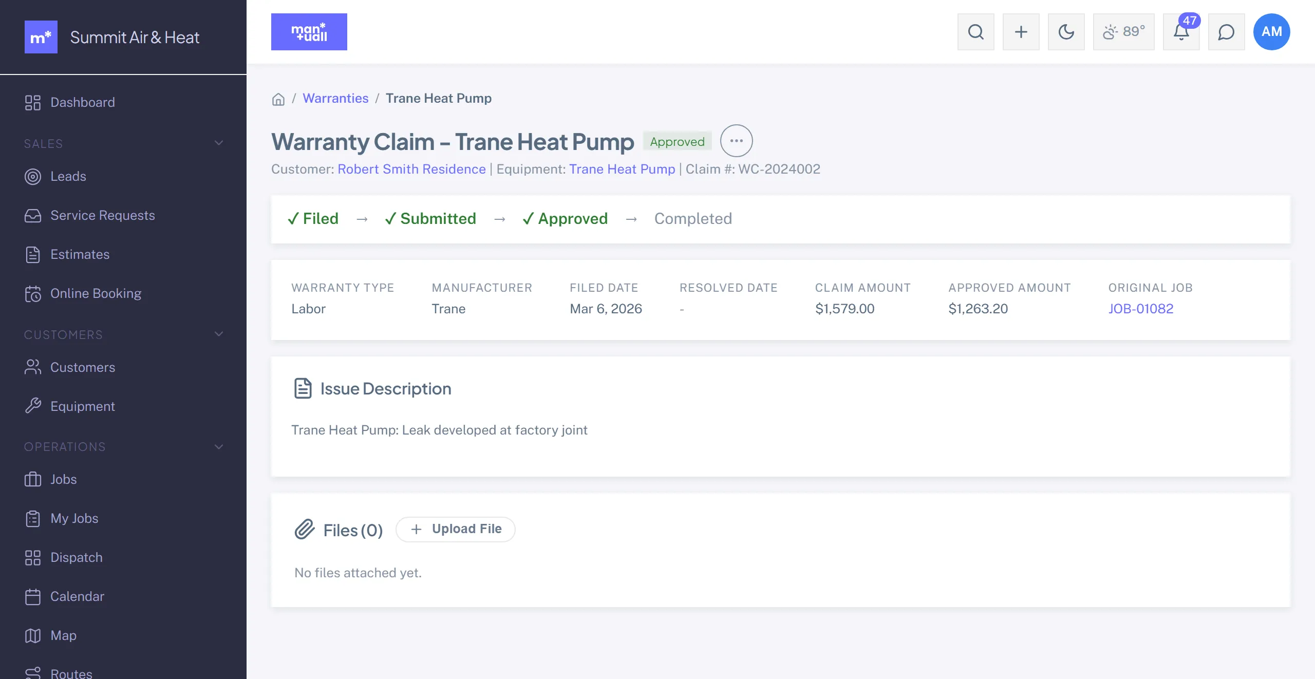 A warranty claim detail page showing a filed to approved status trail, claim and approved amounts, and the issue description